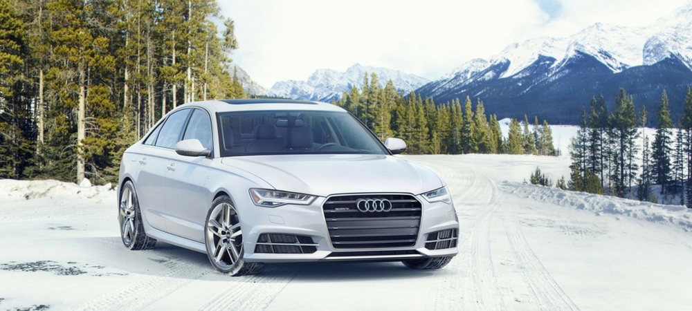 2017 Audi A6 on a snow covered road in a blog about Audi lease deals